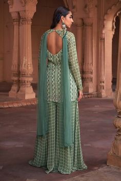 Sage green padded kurta with grid and floral print and sequins embroidery. Comes with sharara and a choker dupatta. - Aza Fashions Green Sharara With Motifs For Eid, Eid Green Sharara With Motifs, Fitted Green Kurta With Motifs, Fitted Green Sharara For Transitional Season, Designer Green Anarkali Set With Motifs, Green Anarkali Set With Motifs For Eid, Green Semi-stitched Sharara With Motifs, Green Sets With Motifs In Traditional Drape, Green Traditional Drape Sets With Motifs