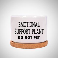 a dog bowl that says,'emotionally support plant do not pet '