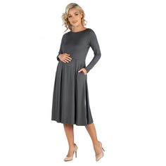 A fall wardrobe must have. This midi maternity dress for women is great for any occasion whether casual or dressy. Featuring a round neckline, long sleeves, midi length hemline, pleated waist, and pockets for a finishing touch. Pair this fit n flare dress with ballet flat for a casual look or create a dressy look with heels. Available in nine beautiful color options, youll want one in every color. Made from a soft and comfortable stretch material that is machine washable for easy care. Casual Long Sleeve Maternity Dress For Fall, Maternity Fall Dresses, Bump Friendly, Fall Maternity Dresses Bump Friendly, Fall Maternity Bump Friendly Dresses, Fall Maternity Wear Dress, Fall Maternity Wear Dress Bump Friendly, Maternity Wear Bump Friendly Dress For Fall, Gray Midi Dress For Fall, Midi Maternity Dress