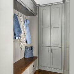 the closet is clean and ready to be used as a mudroom or dressing room