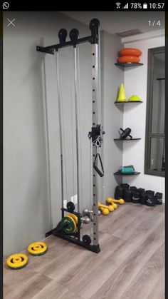 a home gym with equipment on the floor