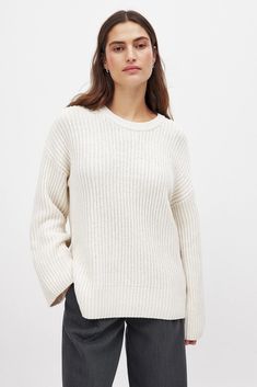 Round Neck Knitted Sweater Offwhite | NA-KD Cozy White Cropped Sweater With Ribbed Cuffs, Oversized Knit Cropped Sweater With Ribbed Neckline, Oversized Cream Ribbed Sweater, Cozy Ribbed Sweater In Winter White, Winter White Textured Knit Crew Neck Sweater, Winter White Ribbed Knit Sweater, White Ribbed Knit Top For Fall, White Knit Cropped Sweater With Ribbed Cuffs, Cream Cropped Crew Neck Sweater With Ribbed Cuffs