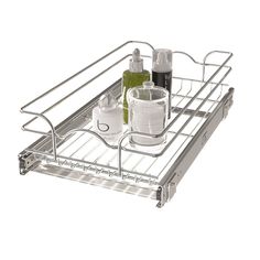 a metal shelf with two bottles and soap dispensers on it's sides