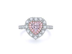 a pink and white diamond heart shaped ring