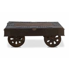 an old fashioned wooden cart with wheels