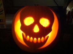 a pumpkin carved to look like a skull