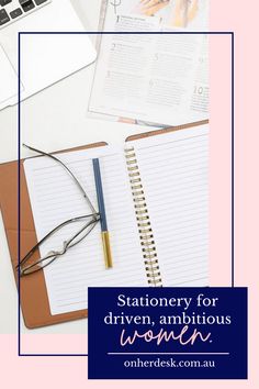 stationery for driven, ambitious women on her desk with laptop and notebook in the background