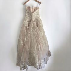 a dress hanging up on a hanger