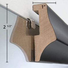 a close up of a door handle on a white wall with measurements for the width