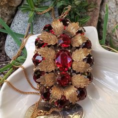 An Absolutely Gorgeous 1920's/30's Ruby Red Czech Glass Pendant With A 12kt Gold Fill Chain. This Fabulous Flapper Era Find Features 15 Large Facet Cut, Prong Set Ruby Red Stones Set Off By 12 Exquisitely Detailed Gold Fill Leaves. Set On A 24" 12kt Gold Fill Chain This Pendant Is 3" By 2". It Is A Magnificent Antique Piece. In Fine Antique Condition. Flapper Era, Vintage Jewelry Antique, Vintage Jewellery Rings, Red Stones, Red Stone, Gold Filled Chain, Glass Pendant, Ruby Red, Stone Settings