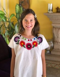 "Mexican floral embroidery blouse, with beautiful multicor embroidery, embroidered blouse to the front and back, fresh blanket blouse, ethnic blouse. This blouse is one size and fits M/L The embroideries of each blouse are unique so they may vary Mexican textile art has centuries of history and creativity throughout the country. Mexico is recognized as one of the leading countries with a beautiful aristic production in the textile world, miraculous hands of talented artisans from different state Floral Embroidery Blouse, Mexican Huipil, Hand Embroidered Blouse, Mexican Textiles, Traditional Mexican, Embroidery Blouse, Embroidered Blouse, Cotton Blouses, Floral Blouse