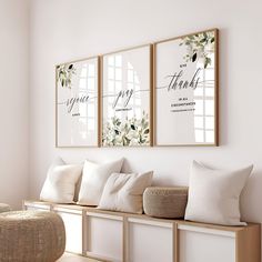 three framed pictures hang on the wall above a wooden bench with pillows and throw pillows