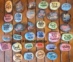 many different colored rocks with words on them