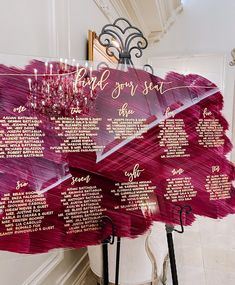 a wedding seating chart on display in a room