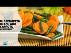 sliced green beans and carrots on a white plate