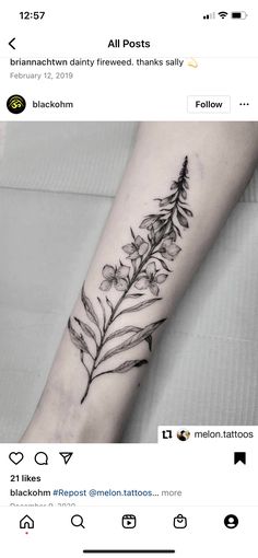 a black and white photo of a flower tattoo on the left forearm, with an arrow in