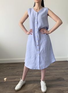 "Handmade MaTuTu Linen Style loose sleeveless washed linen dress with pockets, buttons and belt. The dress can be worn on two sides with the front or back fastening. *100% local medium weight linen *Suitable for maternity *Each item is individually cut and sewn by order *The model is wearing size S, dress color - Light blue *The model height is 168 cm *Note that colors may look different on your display depending on their settings and technical characteristics. Please let us know if you need dif Sleeveless Linen Dress With Button Closure, Summer Linen Daywear Dress With Buttons, Sleeveless Linen Dress With Buttons For Spring, Casual Sleeveless Linen Dress With Buttons, Sleeveless Linen Dress With Buttons For Daywear, Sleeveless Linen Dress With Buttons For Beach, Light Blue Sleeveless Dress With Buttons, Sleeveless Linen Dress In Flax For Daywear, Sleeveless Linen Shirt Dress For Spring