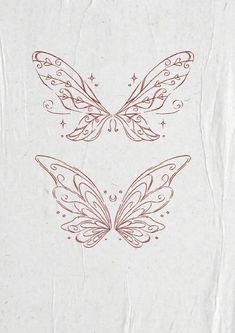 two red butterflies on white paper with stars and swirls in the wings, one is drawn