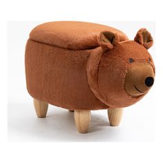 a brown teddy bear foot stool with wooden legs and head on it's back