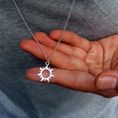 ♥ This delicate necklace is perfect for women or men that want a little chic, minimalist sparkle. This is a Sterling Silver sun charm necklace. Both the charm and the necklace are Sterling Silver. This necklace is great as a gift for a man or a boy. Please look at the measurements of the charm before ordering. Photos can sometimes make charms appear larger or smaller than they actually are. Measurement of Charm in mm: 18mm Measurement of necklace length in Inches: You will be able to select a 16 Sun Jewelry Men, Best Necklace For Men, Silver Chain With Pendant Men, Mens Charm Necklace, Cool Mens Necklace, Guys Jewelry Necklaces, Men Charm Necklace, Silver Pendant Necklace Men, Mens Necklace Silver