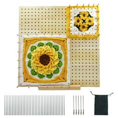 two square crocheted squares with flowers on them next to knitting needles and hooks