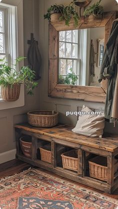 a wooden bench sitting in front of a mirror on top of a rug next to a window