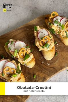 some food is laying on top of a wooden board