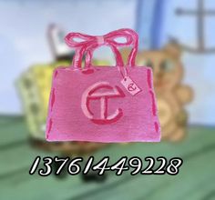 a pink handbag with a bow on it