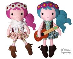 two dolls are wearing clothes and holding guitars