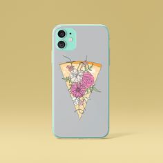 a phone case with flowers on it and a slice of pizza in the back ground