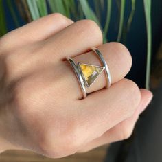 Ready to dispatch in 1-3 days! One of a kind, fully handcrafted using sterling silver. This Citrine double band ring is perfect for the geometric shape lovers. Fits size US - 7.5, UK - O These are one of a kind stones, therefor this ring cannot be replicated exactly the same. However, if you like the design, please get in touch and I can make it for you using a similar stones, if available. Be aware that handmade products may vary one from another, as the entire process is made by hand and not b Modern Sterling Silver Topaz Open Ring, Modern Sterling Silver Open Topaz Ring, Minimalist Sterling Silver Rings With Natural Inclusions, Sterling Silver Triangle Rings As Gift, Sterling Silver Triangle Rings For Gifts, Double Band Ring, Double Band Rings, Handmade Products, Band Ring