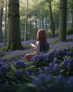 a woman sitting on the ground reading a book in a forest filled with purple flowers