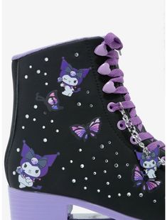 a pair of purple and black boots with cats on them