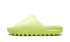 The adidas Yeezy Slide “Glow Green 2022” is a hi-vis colorway of Kanye West’s popular slip-on sandal that was released in full family sizing in May 2022.  The “Glow Green” Yeezy Slide debuted in May 2021 before returning in slightly more quantities in May 2022.  As for its design, the “Glow Green” features a neon green-colored lightweight EVA foam construction that provides optimal comfort.  The midfoot arch stabilizes the foot and the ridged outsole ensures grip on slippery surfaces.  Release d 2022 Shoes, Yeezy Brand, Earth Tone Palette, Meds For Dogs, Adidas Yeezy Slide, Glow Green, Yeezy Slides, Comfortable Sandals, Eva Foam