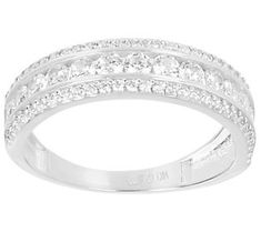 a white gold ring with rows of diamonds