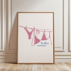 an art print with clothes hanging on a line and the words balls summer below it