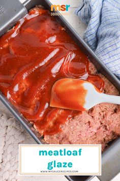 meatloaf glaze in a baking pan with a spoon