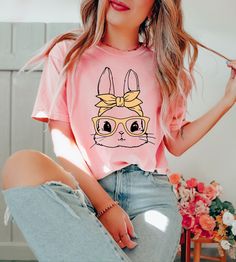 Cute Bunny With Glasses Shirt,Rabbit Sweatshirt,Bunny Hoodie,Cute Sweatshirt For Women,Gift For Her,Easter Gift,Ladies Easter Bunny tee We design trendy sweatshirts that you can use in every important day of your life. We produce beautiful and quality designs that can be used in all kinds of activities that you will do with your family or friends. These designs will offer you and your environment a unique complement. We are very excited to bring you our high quality and soft, trendy sweatshirt. Easter Shirts For Women, Bunny With Glasses, Trendy Sweatshirts, Bunny Graphic, Bunny Hoodie, Easter Shirts, Easter Bunny Shirts, Single Shirt, Hoodie Cute