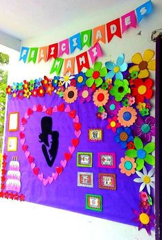 a purple bulletin board decorated with flowers and hearts