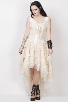 This Victorian dress is more than just a celebration of the always engaging marriage between gothic and Victorian fashion. This ivory vintage dress is perfect for those who like their gothic fashion items to have a decided timeless flair. You will certainly be able to wear this corset dress for just about any occasion Vintage Corset Dress, White Corset Dress, Gothic Mode, Floral Lace Skirt, Vintage Corset, Brocade Dresses, White Corset, Ivory Dresses, Luxury Dress