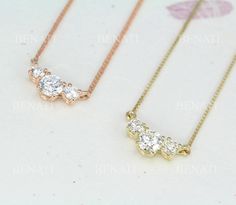 Exclusive To Benati A very elegant and classic solid 14k gold diamond (CZ) necklace. A dainty three cubic zircon gold necklace and matching gold chain. Crafted to perfection. Including a chain at available lengths 42 cm (approx. 16") or 45 cm (approx. 17").  The chain is a delicate 'box' style chain. Approx. 0.6 mm thickness chain. You or your dear friend will look super fine with this new exclusive design - by Benati. Lab white stones weight approx.: 0.70 total. high clarity and color. Center s Leaf Wedding Ring Set, Diamond Gold Necklace, Leaf Wedding Rings, Gold Leaf Rings, Leaf Engagement Ring, Gold Necklace Simple, Antique Wedding Rings, Moonstone Engagement, Moonstone Engagement Ring