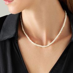 Embrace the subtle elegance of this delicate freshwater pearl necklace, featuring lustrous 4mm natural pearls and a secure with 18K gold lobster clasp. Perfect for adding a refined touch to any outfit, this necklace is ideal for both everyday wear and special occasions. The smaller pearls offer a dainty, classic look that exudes sophistication. Whether worn alone or layered with other necklaces, this piece is a versatile addition to any jewelry collection. Elevate your style with this timeless necklace, designed for those who appreciate understated luxury. Discover understated elegance with our 4mm freshwater pearl necklace, with 18K white gold clasp. Perfect for everyday wear or special occasions. This elegant necklace is crafted with natural freshwater pearls, available in sizes 4mm, 5mm Classic Single Strand Necklace For Everyday Luxury, Elegant Single Strand White Gold Necklace, Classic Single Strand Necklace For Everyday, Classic Everyday Luxury Pearl Drop Jewelry, Elegant White Gold Single Strand Necklace, Timeless Pearl Pendant Jewelry, Delicate Single Strand Necklaces For Formal Occasions, Elegant Necklace With Pearl Drop And Round Beads, Delicate Single Strand Necklace For Formal Occasions