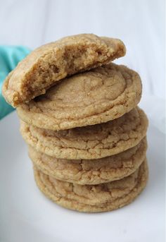 a stack of cookies sitting on top of a white plate