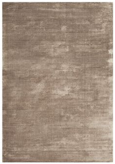 a beige rug with horizontal stripes on the top and bottom, it is very soft