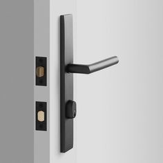 an open door with black handles and knobs