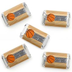 four wrapped chocolate bars with basketballs on them