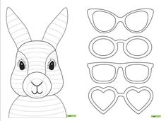 the paper bunny mask is cut out and ready to be used for making it's own face