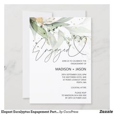 an elegant wedding card with leaves and hearts