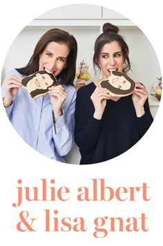 two women holding up plates with faces on them and the words julia albert & lisa gnat