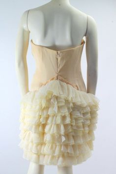 "Vintage Saint Laurent YSL Yellow Scallop Strapless Ruffle Silk Dress  French size 38 This Gorgeous Dress is Pre-owned, Good Condition!! Gently Used!! There are few spots with fabric pulls and snags. No significant wear visible 100% Authentic Guaranteed or your money back!!  Made in FRANCE Fabric is 100% Silk Measurements in Inches: Waist Across 14\" Bust across 15.5\" Back zipper 13\" Total Length 27\"" Cream Strapless Dress With Ruffles, Strapless Cream Dress With Ruffles, Yellow Silk Dress With Ruffles, Vintage Saint Laurent, Skirt Shorts Outfit, Ruffled Silk Dress, Dress Clothes For Women, Gorgeous Dresses, Short Outfits